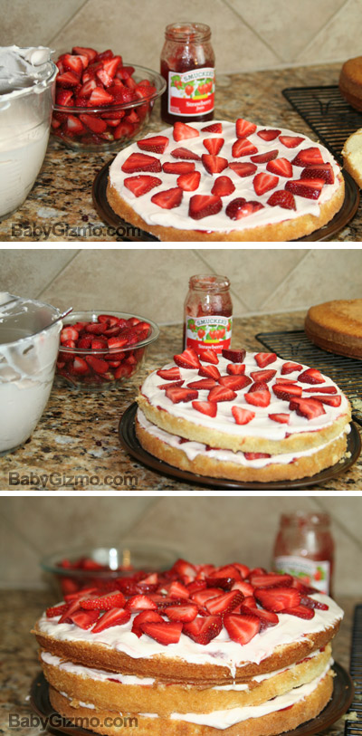 three layers of vanilla cake with frosting and strawberries