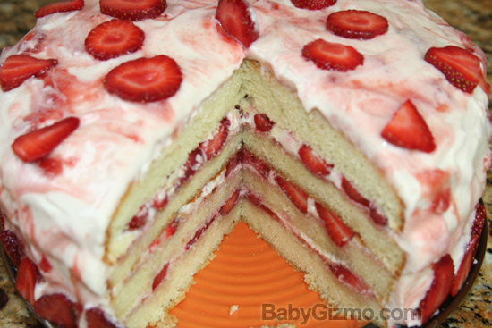 Strawberry cake with piece cut out