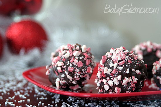 Chocolate Peppermint Rice Krispie Balls with mint candies on red plate