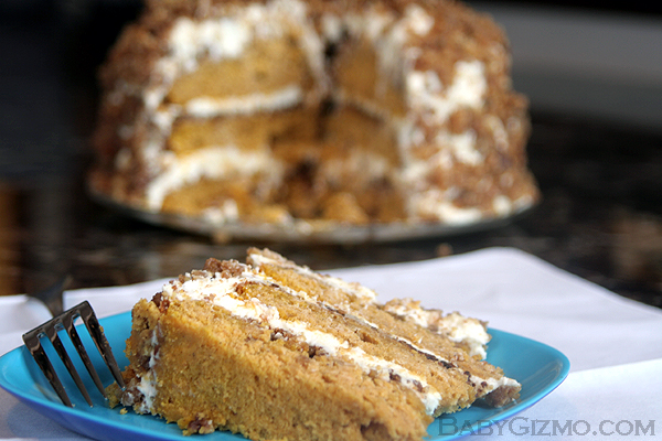 Pumpkin Crunch Cake with one piece cut on blue plate