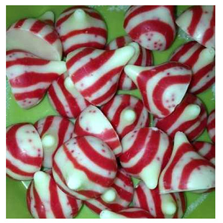 red and white Peppermint chocolate candies on green plate