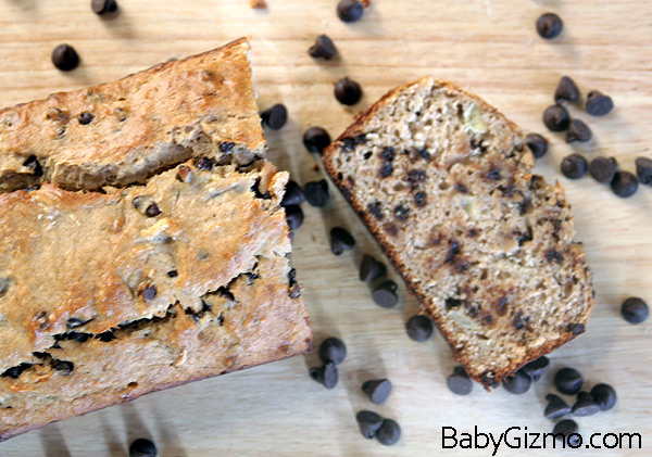 Banana Bread on cutting board with one piece cut