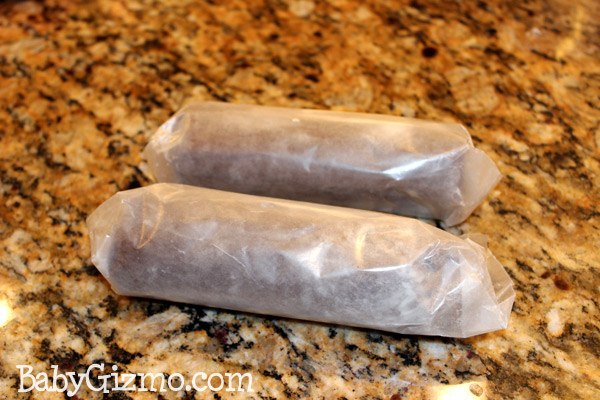 two rolls of thin mint cookie dough wrapped in wax paper