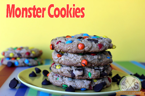 Monster Cookies stacked on yellow plate with yellow background