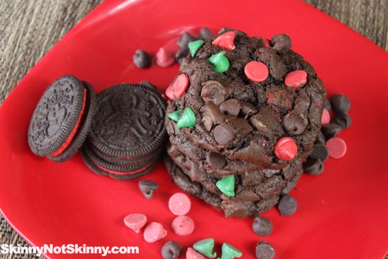 stack of chocolate holiday cookies on red plate
